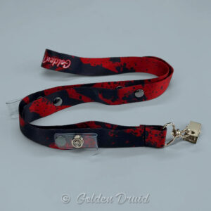 ink red ultimate badge lanyard black abstract splotches splatter pattern