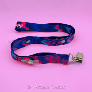 magenta melt ultimate badge lanyard furry convention accessory in hot pink blue purple melting design pattern with multiple clips