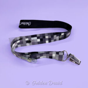 pixel noir ultimate badge lanyard furry convention accessory in black and white bw b/w checkered square design pattern with multiple clips
